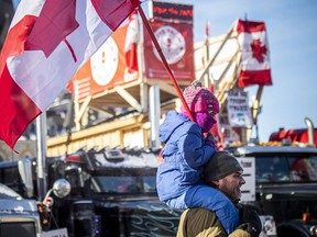 A young child at the Freedom Convoy protest in Ottawa on Feb. 13.