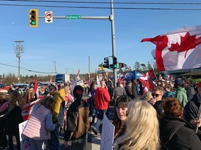 Protesters, truckers and supporters near the U.S. border Saturday, Feb. 13, 2022.