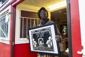 Roger Collins with the Sept. 7, 1968 Jimi Hendrix concert poster, when the backup bands were Vanilla Fudge, the Soft Machine and Eire Apparent. It was the only Vancouver show Hendrix played after he became a star. A May, 1969 show was cancelled.