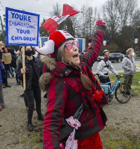 Vaccine mandate protests and counter-protesters at the corner of Hastings and Renfrew on Feb. 19, 2022. Jason Payne/PNG