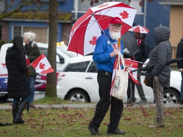 Several dozen anti vaccine mandate protestors, marshalling for a 'freedom rally', are met by an equal number of counter protestors at E. Hastings and Renfrew Streets Saturday morning, February 19, 2022. The police eventually stepped in to keep the groups separate as the convoy left.