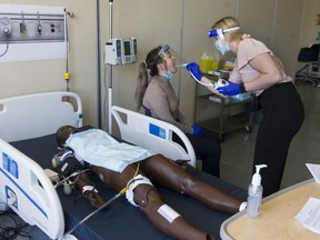 First-term nursing students at BCIT learning health assessment skills the Burnaby campus on May 13, 2021.