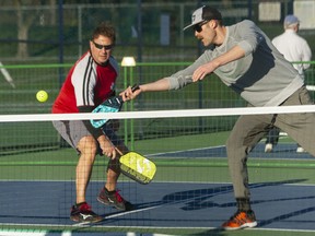Playing pickleball at Queen Elizabeth Park in Vancouver