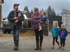 Phil and Trina Graham with their four children are living in an RV on their Abbotsford dairy farm after their home and property were destroyed in the November floods.