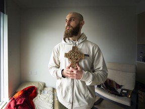 Oleh Hlyniailiuk at his home in Vancouver. Hlyniailiuk, 26, is going back to Ukraine to help out and join the resistance army. Photo: Arlen Redekop/PNG