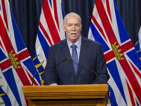 Premier John Horgan holds a press conference after the Throne Speech at the B.C. Legislature in Victoria.