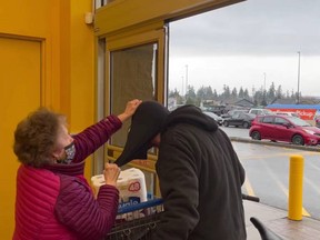 A woman confronts a suspected shoplifter at the Walmart in Campbell River.