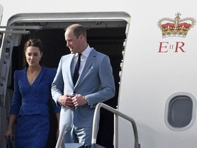 Britain's Prince William, Duke of Cambridge, and Britain's Catherine, Duchess of Cambridge, arrive at Belize City's International Airport on March 19, 2022, at the start of their Caribbean tour. The couple are due to visit Belize, Jamaica and the Bahamas to mark Queen Elizabeth II's Platinum Jubilee.