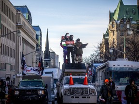 Protesters gathered around Parliament Hill and the downtown core for the Freedom Convoy protest that made their way from various locations across Canada, Sunday January 30, 2022.