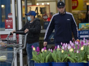 Shoppers with-and-without masks at the Real Canadian Superstore on Grandview Highway in Vancouver on March 14.