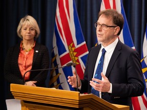 Health Minister Adrian Dix (right) and the provincial health officer, Dr. Bonnie Henry.
