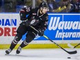 Red Deer Rebels forward Arshdeep Bains moves the puck against the Saskatoon Blades in Western Hockey League during the 1st period action at SaskTel Centre in Saskatoon, SK on Wednesday, January 8, 2020.