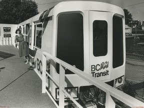 A model ALRT car for Vancouver's new rapid transit system was unveiled for the public on Aug. 1, 1982 at the Pacific National Exhibition. B.C. Transit's Diane Gendron is hanging out of the car.  The system is now known as SkyTrain.