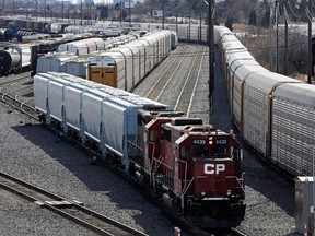 A Canadian Pacific Railway (CP Rail) locomotive backs into position at the company's Toronto Yard in Scarborough March 20, 2022.