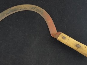 A sickle is an ancient tool, consisting of a curved metal blade and short wooden handle, used to harvest wheat, barley, hay, other cereal crops and grass.