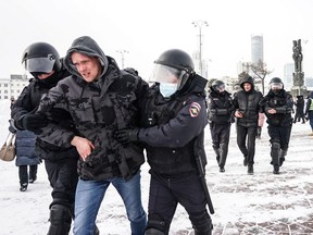 A person is detained during an anti-war protest, following Russia's invasion of Ukraine, in Yekaterinburg, Russia March 6, 2022.