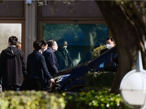 Members of the Chinese diplomatic delegation leave the Cavalieri Waldfor Astoria hotel in Rome on March 14, 2022 where US president's national security adviser, Jake Sullivan, met with senior Chinese Communist Party diplomat Yang Jiechi.