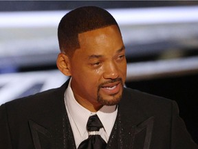 Will Smith cries as he accepts the Oscar for Best Actor in 