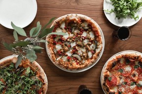 Three frozen pizzas — from left, funghi, pesto roast vegetable, and Calabrese — from Holy Napoli.