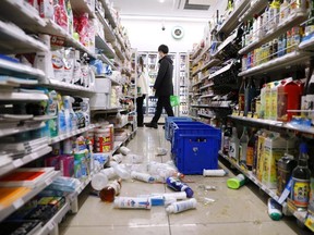 Scattered goods caused by an earthquake are seen at a convenience store in Sendai, Miyagi prefecture, Japan March 17, 2022, in this photo taken by Kyodo.