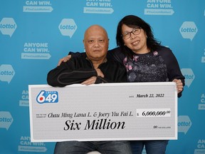 Lana and Joe Leung with their presentation cheque for $6 million won in the March 16 Lotto 6/49 draw.