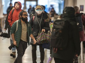 Students at UBC seen wearing surgical masks Monday, March 2, 2020.