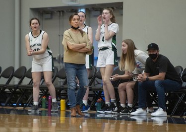 Langley Christian Lightning coach Danielle Gartner watches her team during play against the St. Michaels University School Blue Jags in the Double A semifinal game of girls basketball provincial championships at the Langley Events Centre.