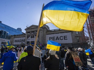 More than a thousand people attend a rally for Ukraine at the Vancouver Art Gallery in Vancouver, B.C. Saturday, March 5, 2022. Worldwide condemnation of Russia followed their invasion of Ukraine February 24.