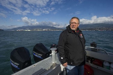 The Tsleil-Waututh Nation have commissioned reports documenting the erosion of the shoreline around Burrard Inlet, changes to sea life and industrial pollution since contact. Pictured is Mike George, cultural and technical advisor for the Tsleil-Waututh Nation, onboard the research vessel Say Nuth Khaw Yum in Burrard Inlet Tuesday, March 8, 2022.