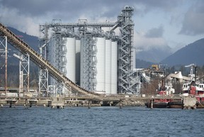 The Tsleil-Waututh Nation have commissioned reports documenting the erosion of the shoreline around Burrard Inlet, changes to sea life and industrial pollution since contact. Pictured is an industrial site as seen from Burrard Inlet March 8, 2022.