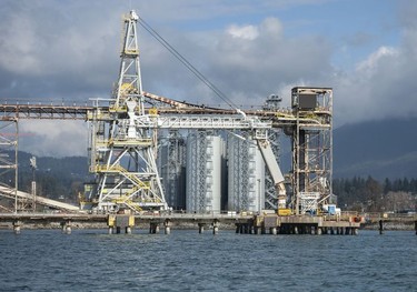 The Tsleil-Waututh Nation have commissioned reports documenting the erosion of the shoreline around Burrard Inlet, changes to sea life and industrial pollution since contact. Pictured is an industrial site as seen from Burrard Inlet March 8, 2022.