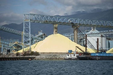 The Tsleil-Waututh Nation have commissioned reports documenting the erosion of the shoreline around Burrard Inlet, changes to sea life and industrial pollution since contact. Pictured is an industrial site as seen from Burrard Inlet March 8, 2022.