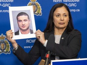 pl. Sukhi Dhesi holds up a photo of Milad Rahimi, 34. Rahimi, who had gang links, was the victim of a brazen public shooting in a supermarket parking lot in North Vancouver on Friday, March 11, 2022.
