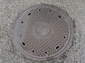 The CPR manhole cover outside 424 Homer St.