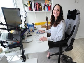 Amanda Nagy is working a hybrid model from her home workspace.