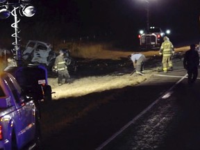 Emergency responders work the scene of a fatal crash late Tuesday, March 15, 2022 in Andrews County, Texas.
