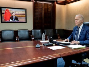 U.S. President Joe Biden holds virtual talks with Chinese President Xi Jinping from the Situation Room at the White House in Washington, U.S., March 18, 2022.