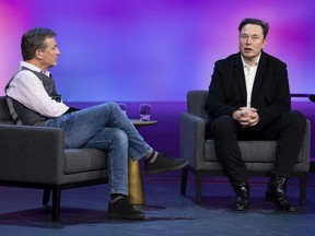 Host Chris Anderson, left, and Elon Musk speak at Session 11 at TED 2022: A New Era, on April 14 in Vancouver.
