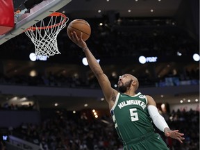 Jevon Carter of the Bucks drives to the basket during Game 5 of the Eastern Conference first-round playoff series against the Chicago Bulls at Fiserv Forum on April 27 in Milwaukee.