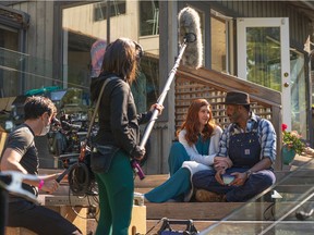 An overwhelming majority of B.C.'s Directors Guild of Canada members have voted yes to a potential strike, after year-long negotiations with producers broke down. Actors Michelle Harrison and Jesse L. Martin are pictured on the set of Re: Uniting which was filmed on Bowen Island in June 2021.