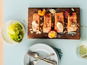 Chef Ned Bell's planked wild salmon with nectarines, thyme, honey, almonds and ricotta.