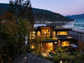 multiple roof tiers, this 3,200-square-foot waterfront home in Deep Cove