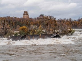 This handout picture released by Niagara Parks on Nov. 1, 2019 shows the carcass of the Iron Scow lodged in the rapids above the Canadian Horseshoe Falls.
