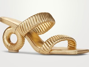 Cult Gaia ‘Valence’ metallic leather mules, $550 at Holt Renfrew, holtrenfrew.com.