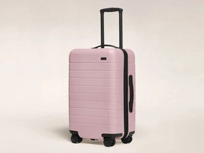 Carry-On suitcase in blush, $345 at Away, awaytravel.com.