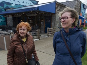 Sandra Holmes (left) and Debbie Price outside Burgoo restaurant on Main Street In Vancouver.