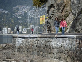 The gate blocking access to the Stanley park seawall was opened to the public Wednesday, April 27, 2022 as repairs were completed on the seaside pathway after a heavy storm caused damage last November. Photo: Jason Payne