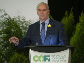 Premier John Horgan speaks at the Council of Forest Industries convention at the JW Marriott Hotel at the Parq Casino in Vancouver on April 29.