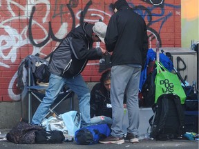 Scenes from the Downtown Eastside (DTES) of Vancouver as social distancing is recommended to prevent the transmission of the COVID-19 virus, in Vancouver, BC., on April 15, 2020.   (NICK PROCAYLO/PNG)