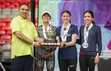 2022 Vancouver Sun Run women's race winner Leslie Sexton (second from right), with runner-up Maria Bernard-Galea (right) and third-place finisher Lanni Marchant (second from left).